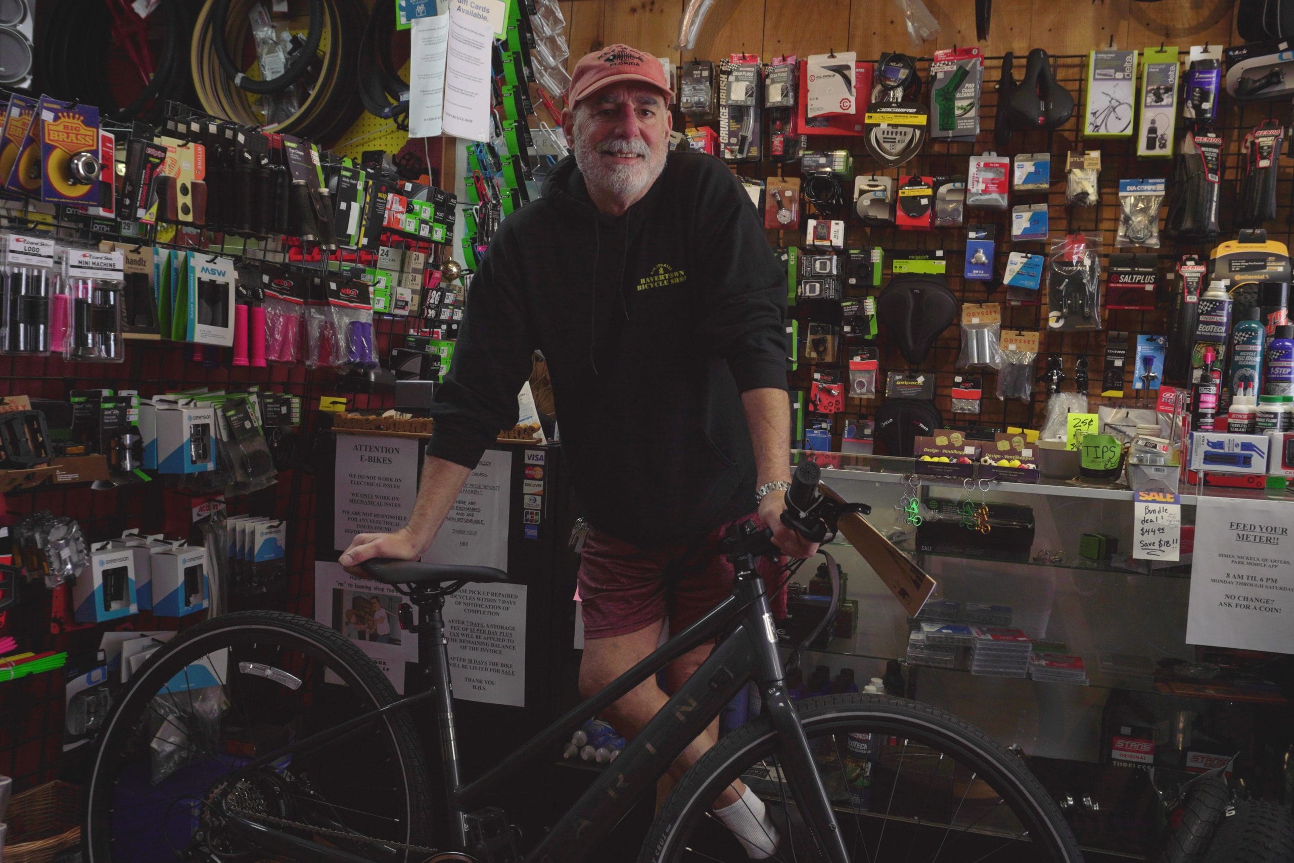 Jonathan Newman working on a bike