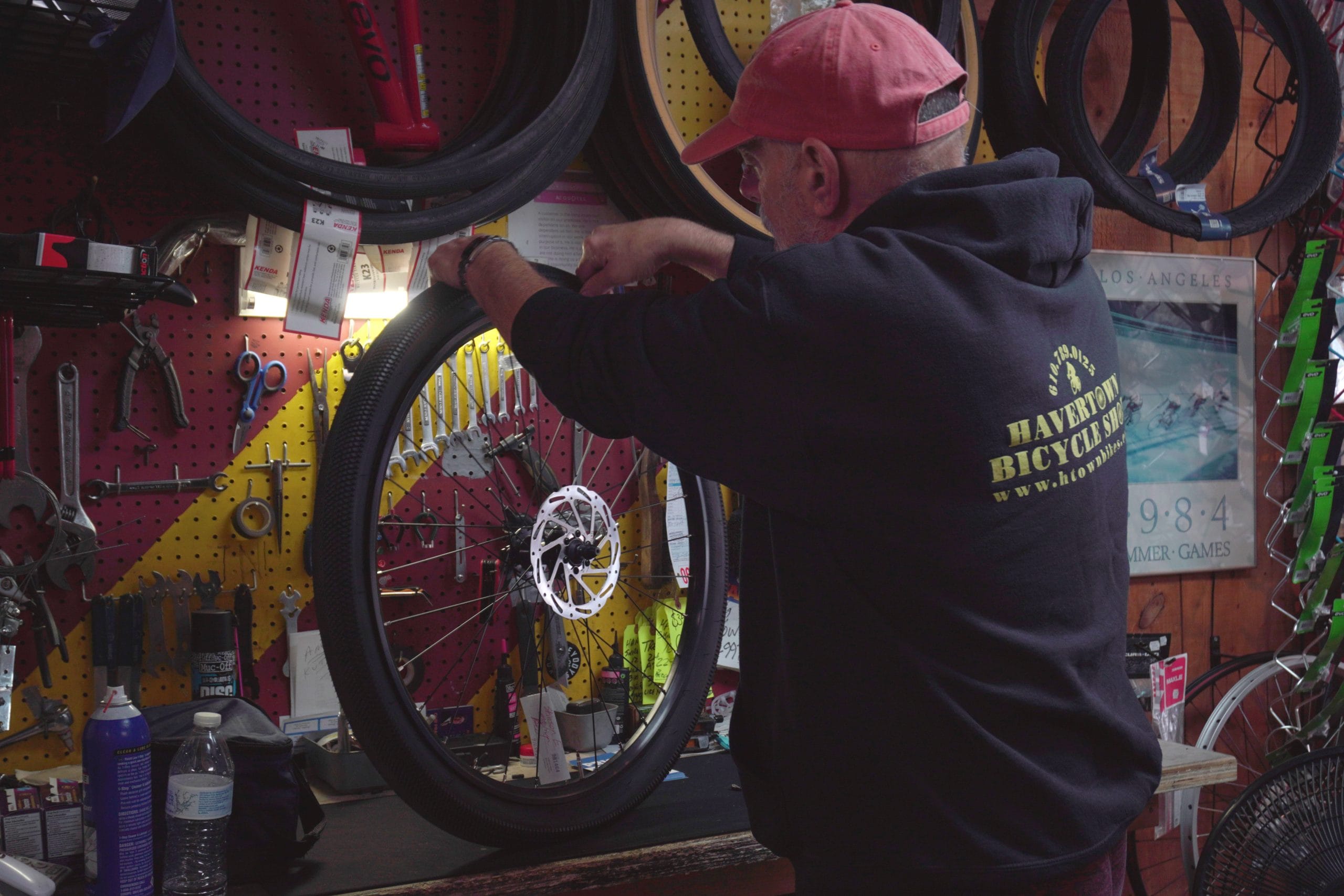 Jonathan Newman working on a bike